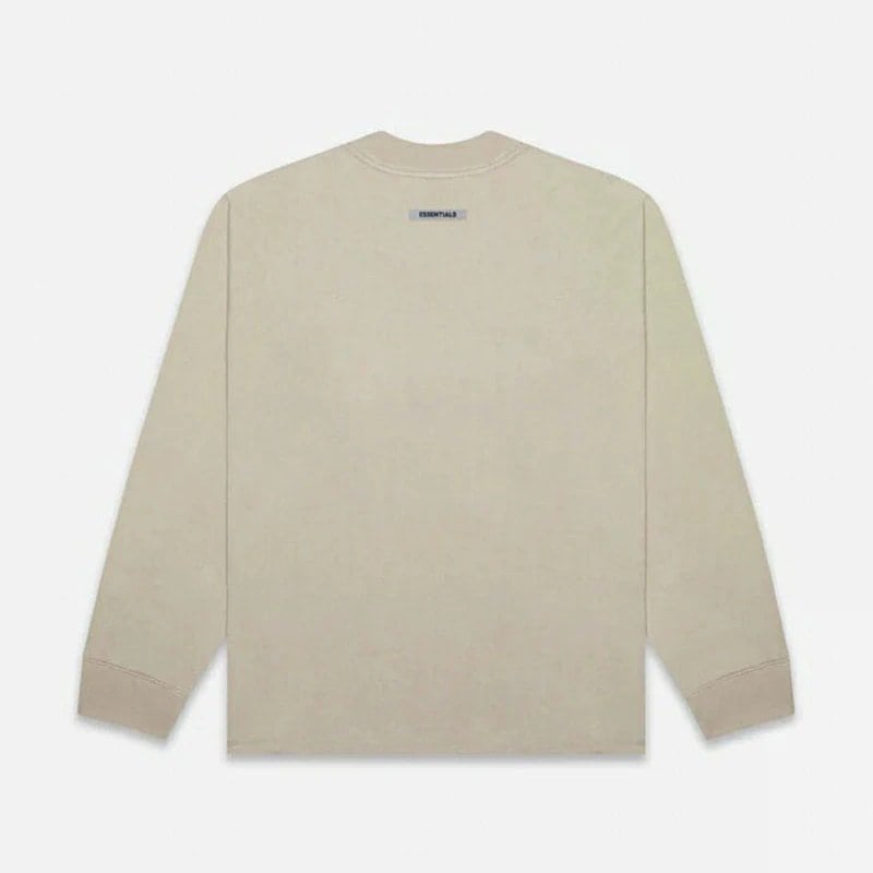 Plain beige long-sleeve T-shirt with small "ESSENTIALS" label at the back neckline.