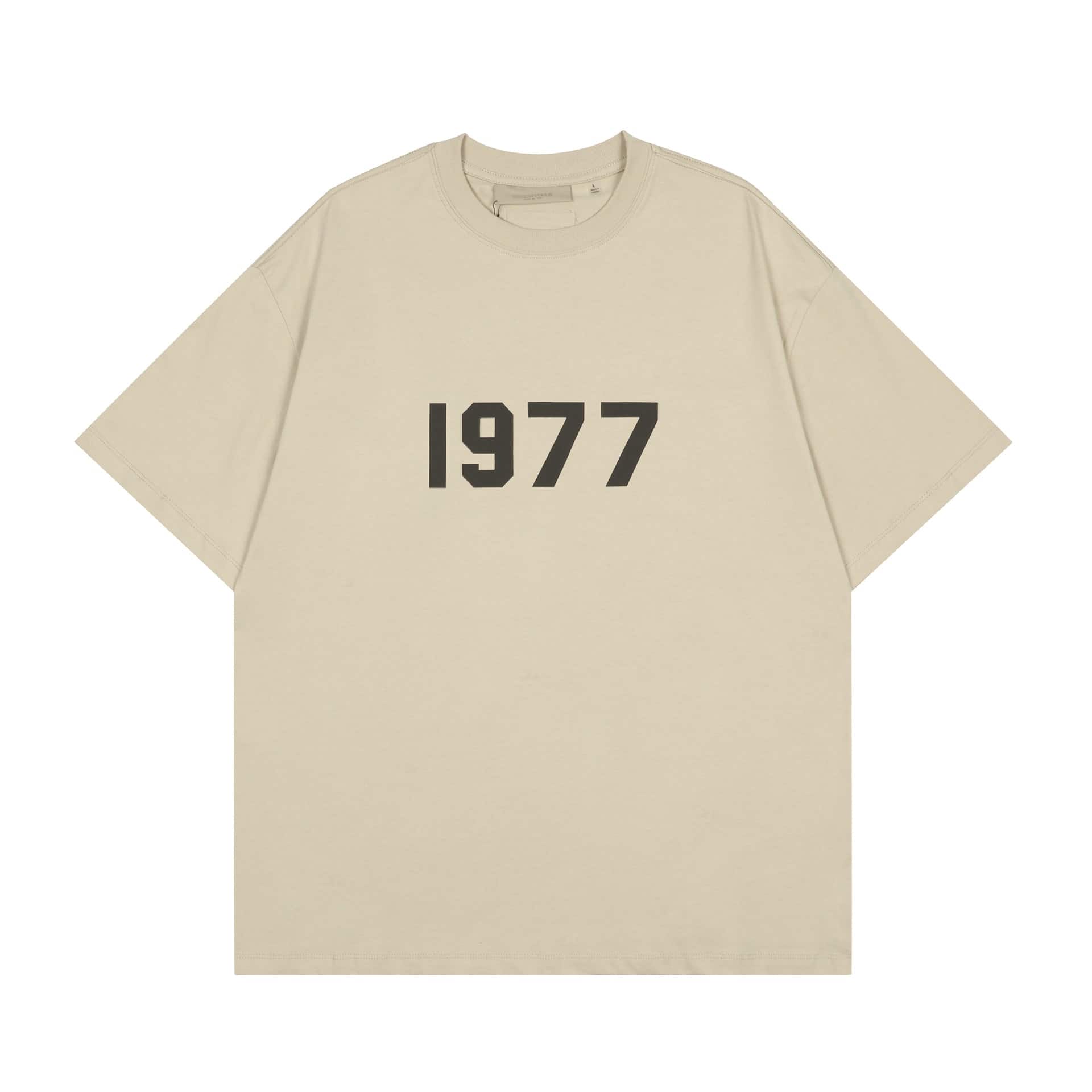 1977 T-shirt with bold black numbers, casual streetwear style.