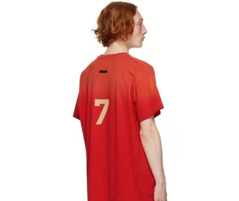 Red sports jersey with the number 7 printed on the back, popular in K-pop merchandise collections.