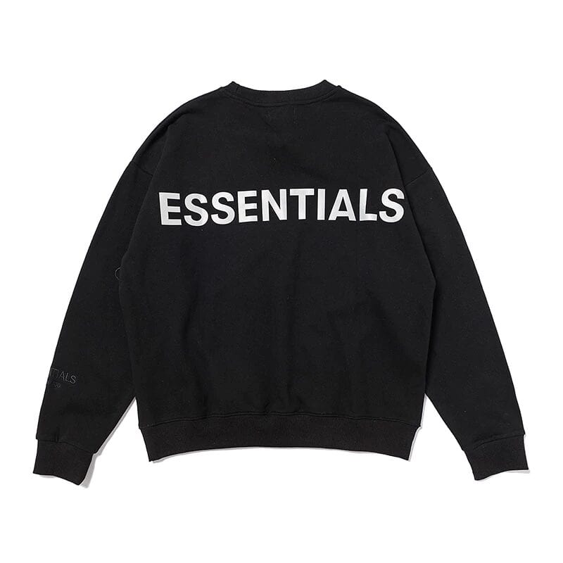 ESSENTIALS black sweatshirt with white text, popular K-pop merch piece, casual streetwear style for K-pop fans.