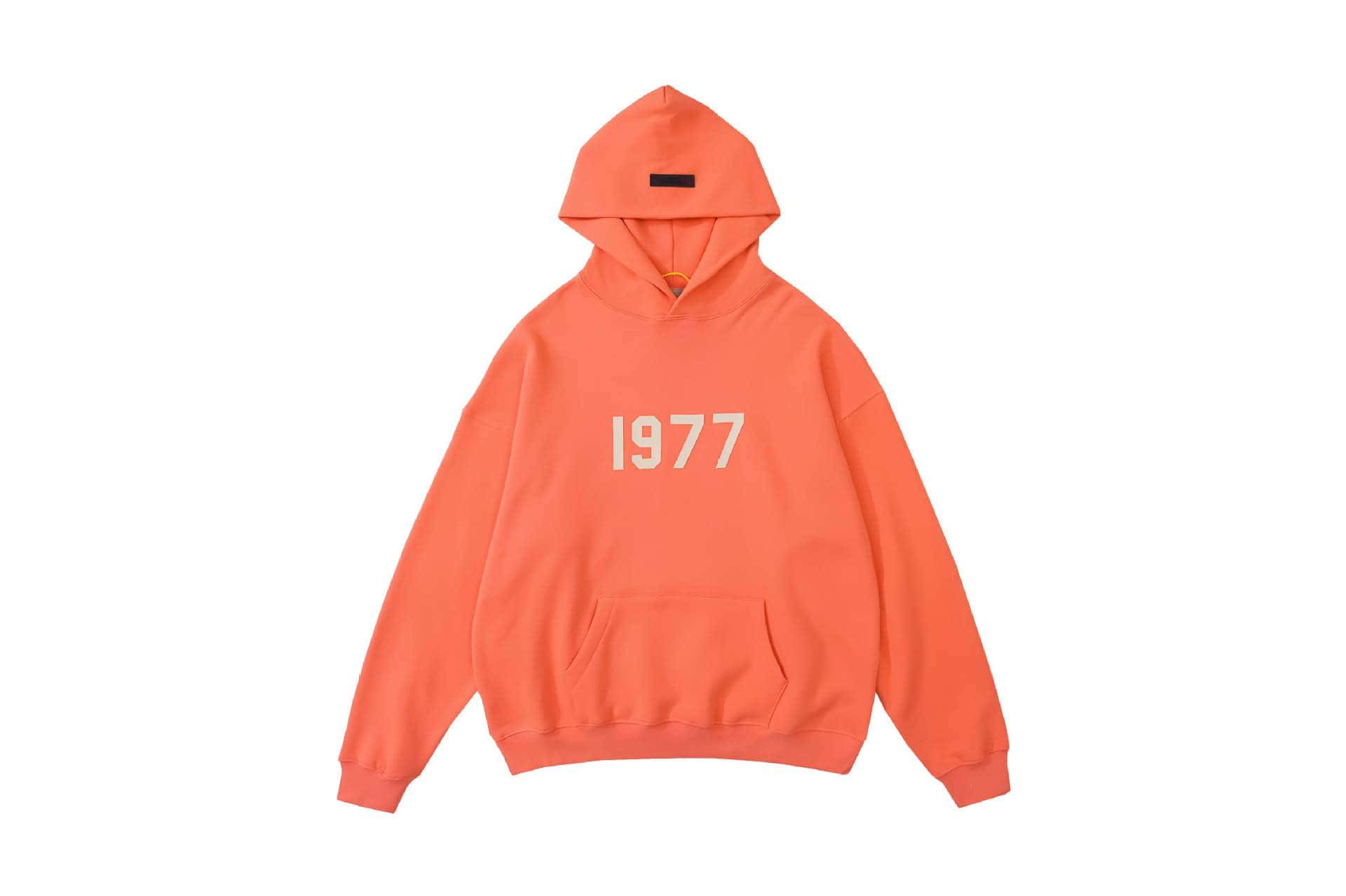 Black and white "twice" K-pop hoodie with the text "1977" printed on the front, featuring a front pocket and a hood. Perfect for fans of the girl group Twice to showcase their love for K-pop merchandise.