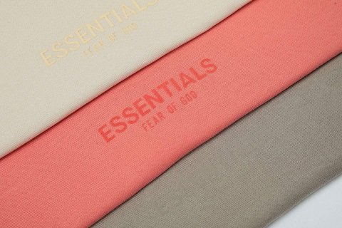 High-quality K-pop merchandise including apparel and accessories in soft pastel and neutral tones, perfect for fans to showcase support for their favorite idols.