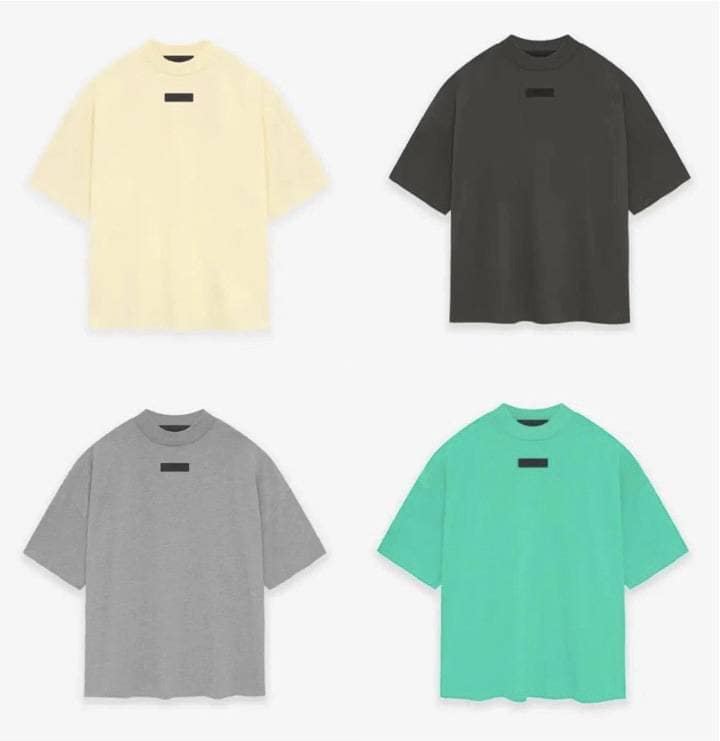 Yellow beige oversized T-shirt, black oversized T-shirt, gray oversized T-shirt, mint green oversized T-shirt, casual K-pop merchandise shirts, trendy K-pop merch, comfortable streetwear for K-pop fans, minimalistic K-pop apparel, unisex K-pop T-shirts, popular K-pop fan shirts.