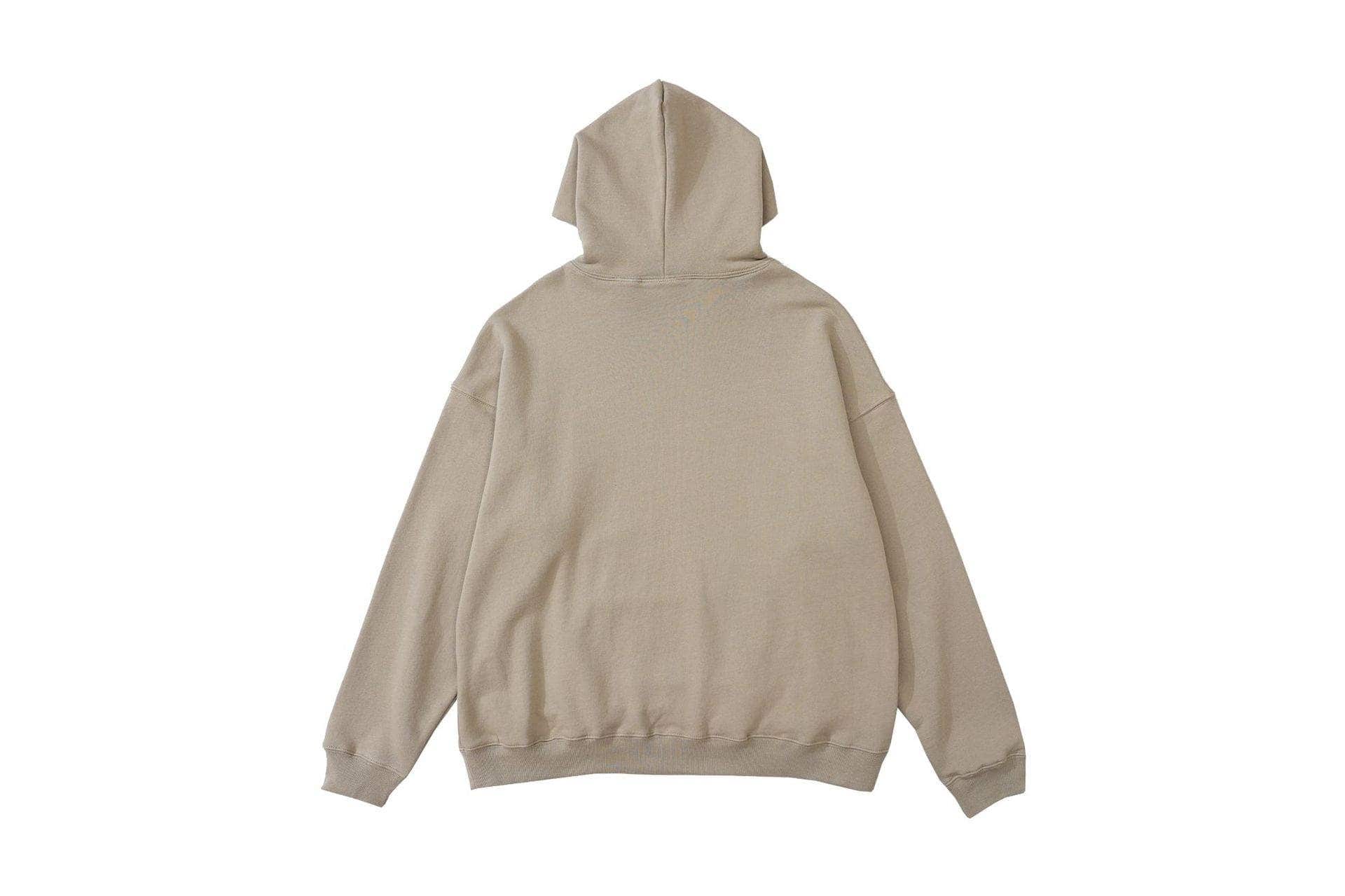 Oversized beige hoodie with hood, casual streetwear style, unisex.
