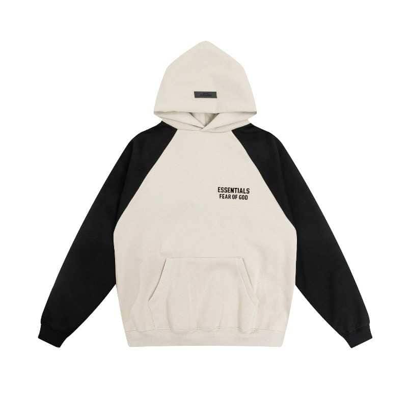 Black and white hoodie with "ESSENTIALS FEAR OF GOD" text, commonly featured in K-pop merch collections.