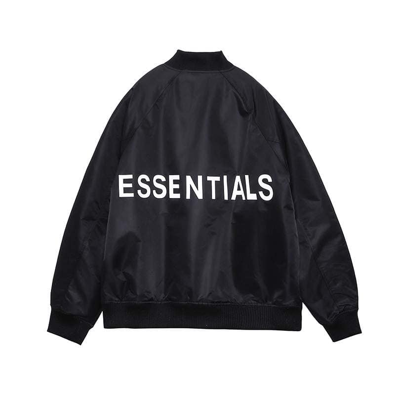 ESSENTIALS K-pop merchandise bomber jacket with bold white text on black fabric, perfect for fans of Korean pop culture and streetwear fashion.