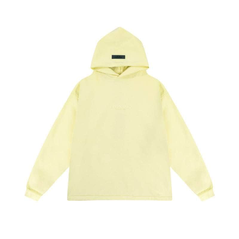 Yellow hoodie with "twice" embroidered on the chest, perfect for K-pop fans, casual streetwear, unisex style, comfortable fabric, and trendy design. Great for fan merchandise collections.