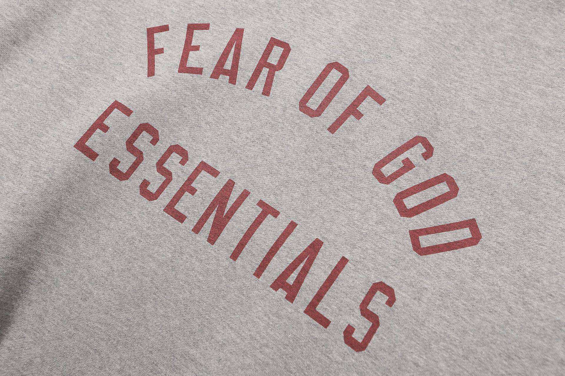 Fear of God Essentials sweatshirt with double Kpop merch design.