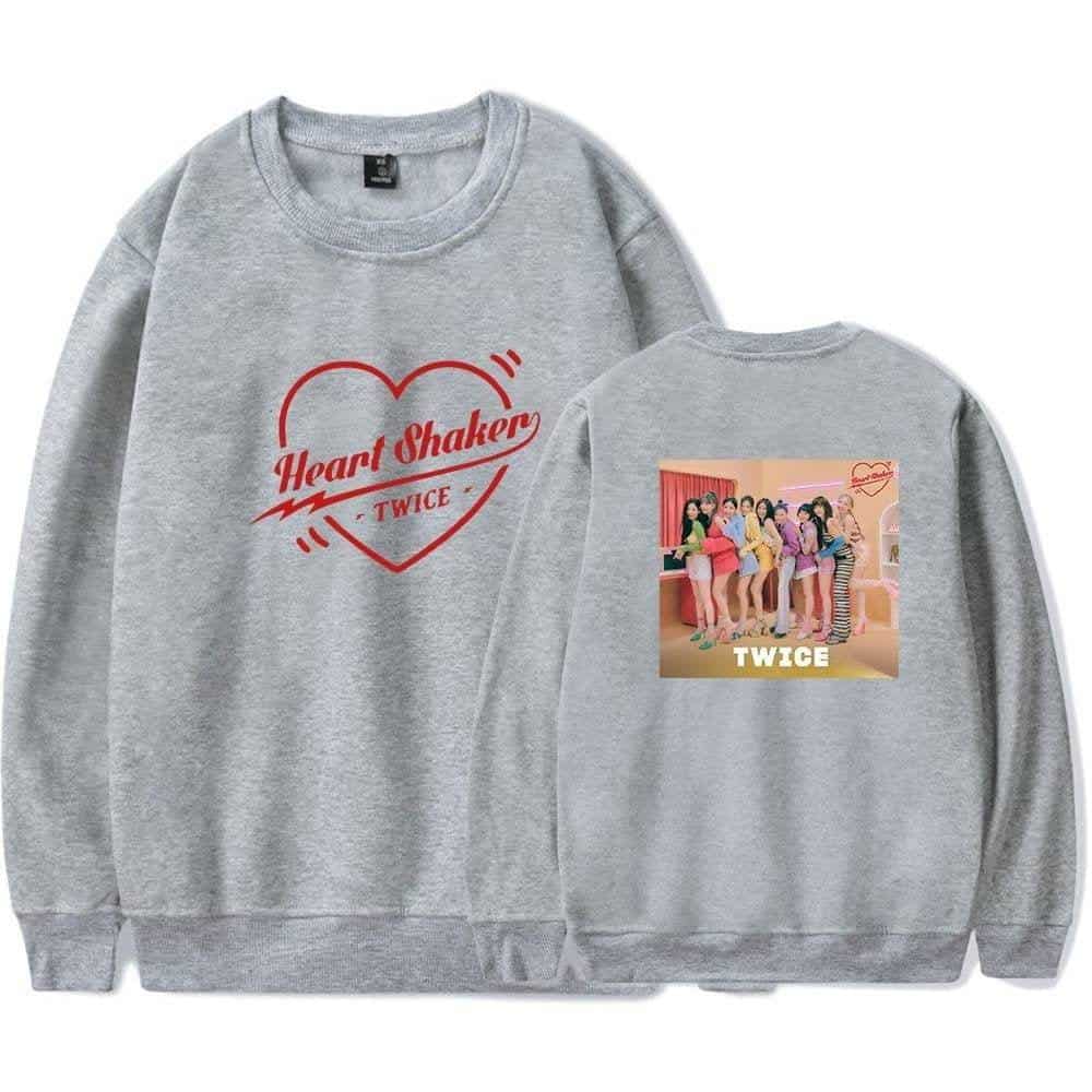 Heart Shaker TWICE sweatshirt, Kpop merchandise for TWICE fans, featuring a graphic of the girl group on the back and TWICE logo. Perfect for Kpop lovers and collectors.
