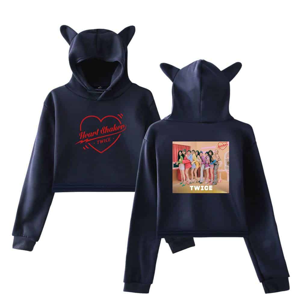 Heart Shaker TWICE black hoodie with cat ears, featuring iconic TWICE group photo on the back and Heart Shaker logo on the front, perfect for K-pop fans.