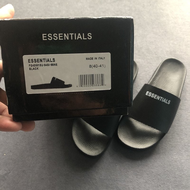 Slides with black strap and "ESSENTIALS" text, made in Italy, size 8 (40-41).