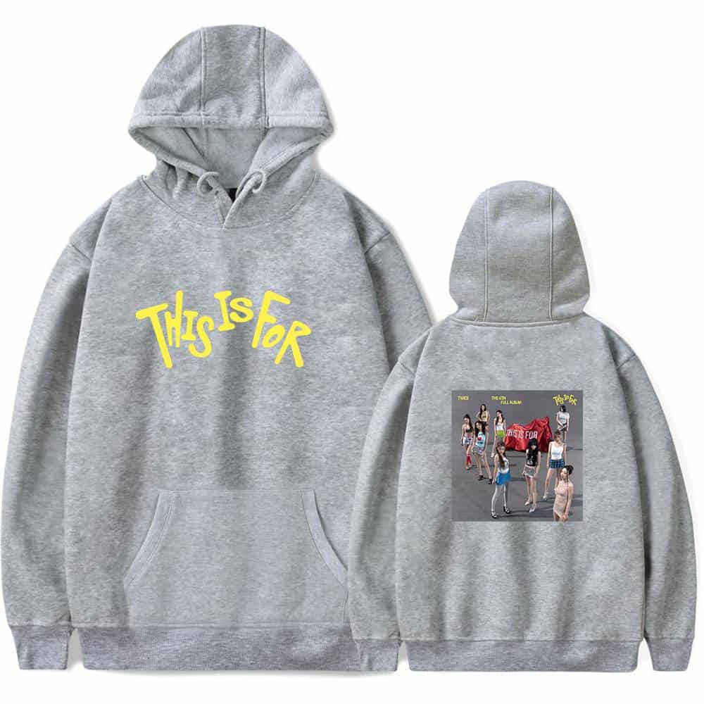 This is an image of a grey hoodie with yellow text that reads "This Is For" on the front, and a group photo of female K-pop idols with a red banner on the back, representing K-pop merchandise.