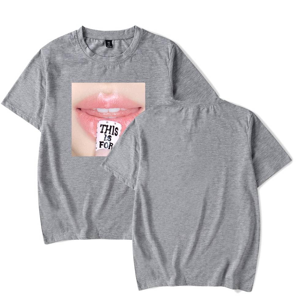 Soft gray K-pop merch T-shirt featuring a close-up image of lips and a candy with "This is for" text design, perfect for K-pop fans and collectors of K-pop merchandise.