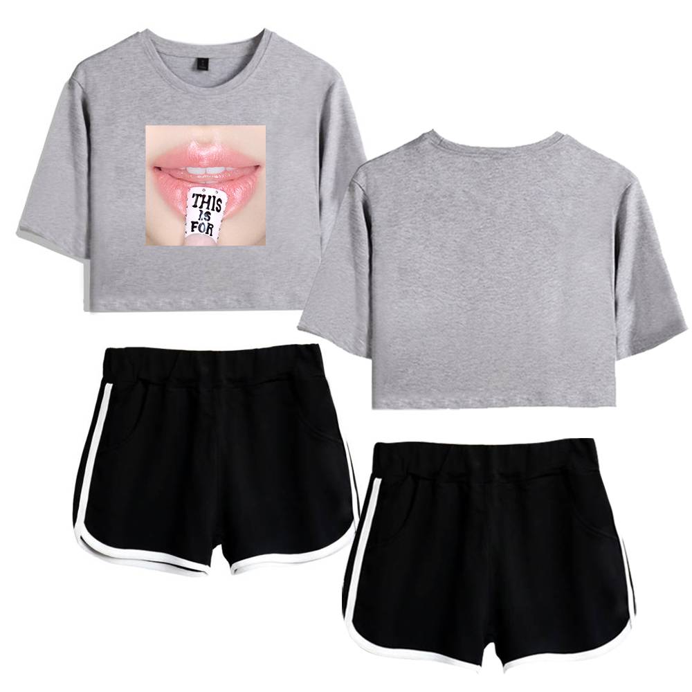Comfy grey crop top with lips and tongue graphic, matching grey occasion T-shirt, black sporty shorts with white trim, casual streetwear for K-pop fans.