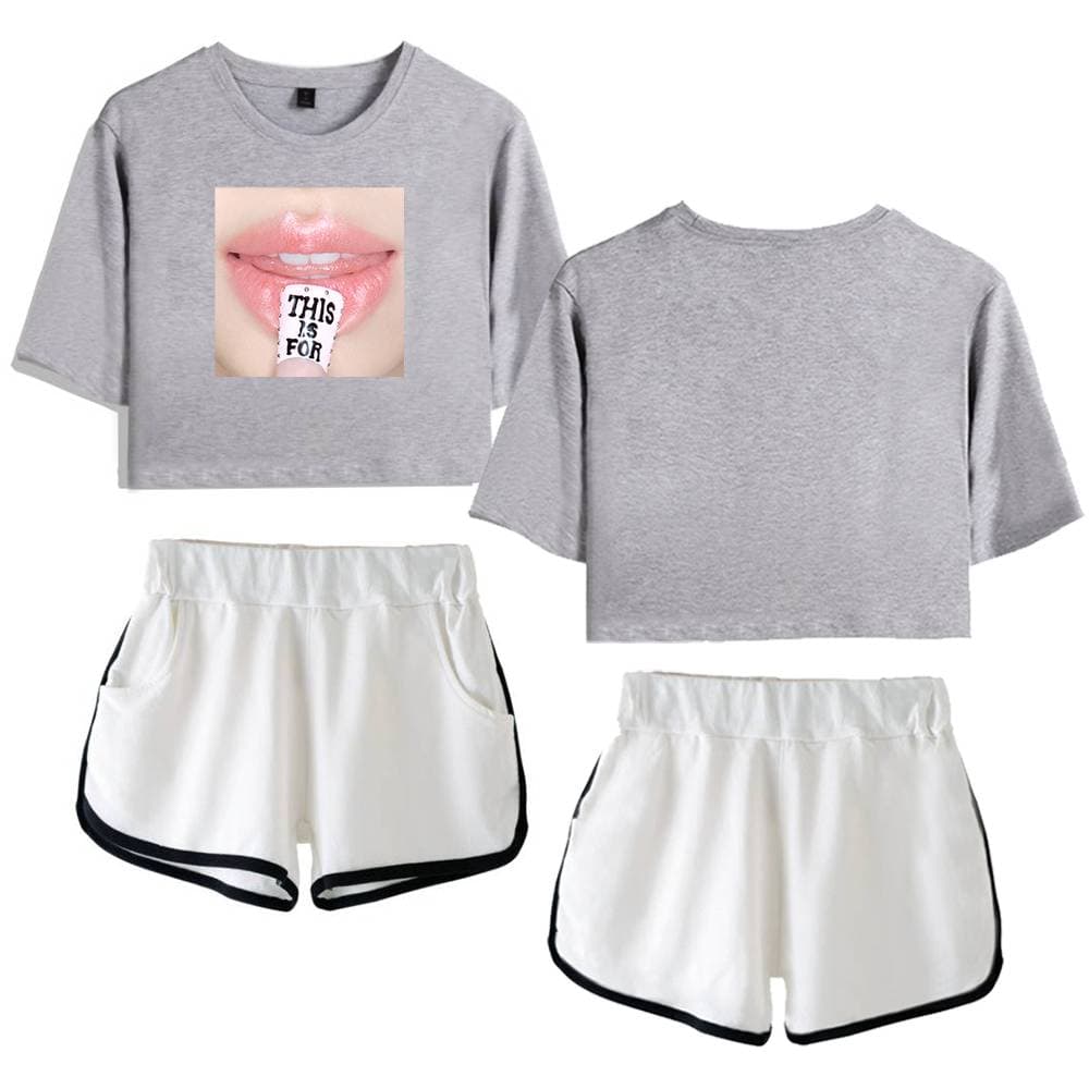 Grey cropped sweatshirt with lips and tongue graphic, white sporty shorts with black trim, casual kpop merch outfit, trendy and comfortable clothing set for fans, stylish attire inspired by K-pop fashion trends.