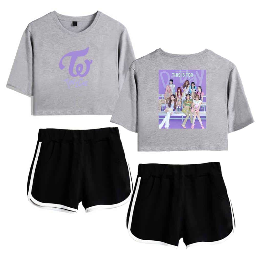 TWICE K-pop merchandise set featuring matching cropped T-shirts with TWICE logo and group image, paired with black shorts with white trim. Perfect for fans to showcase their group pride and style.