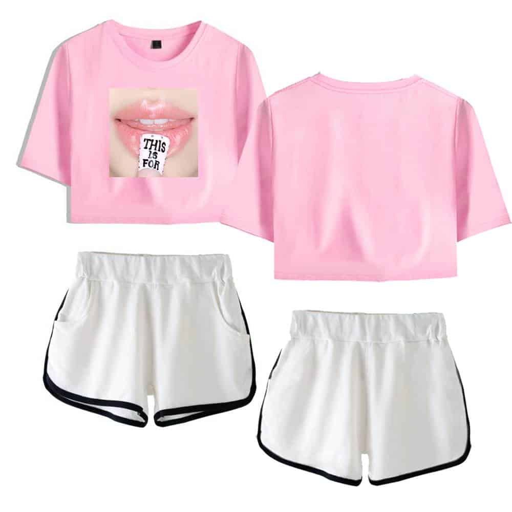 Pink oversized t-shirt with a graphic of lips and tongue saying "This is for", paired with white athletic shorts with black trim.
