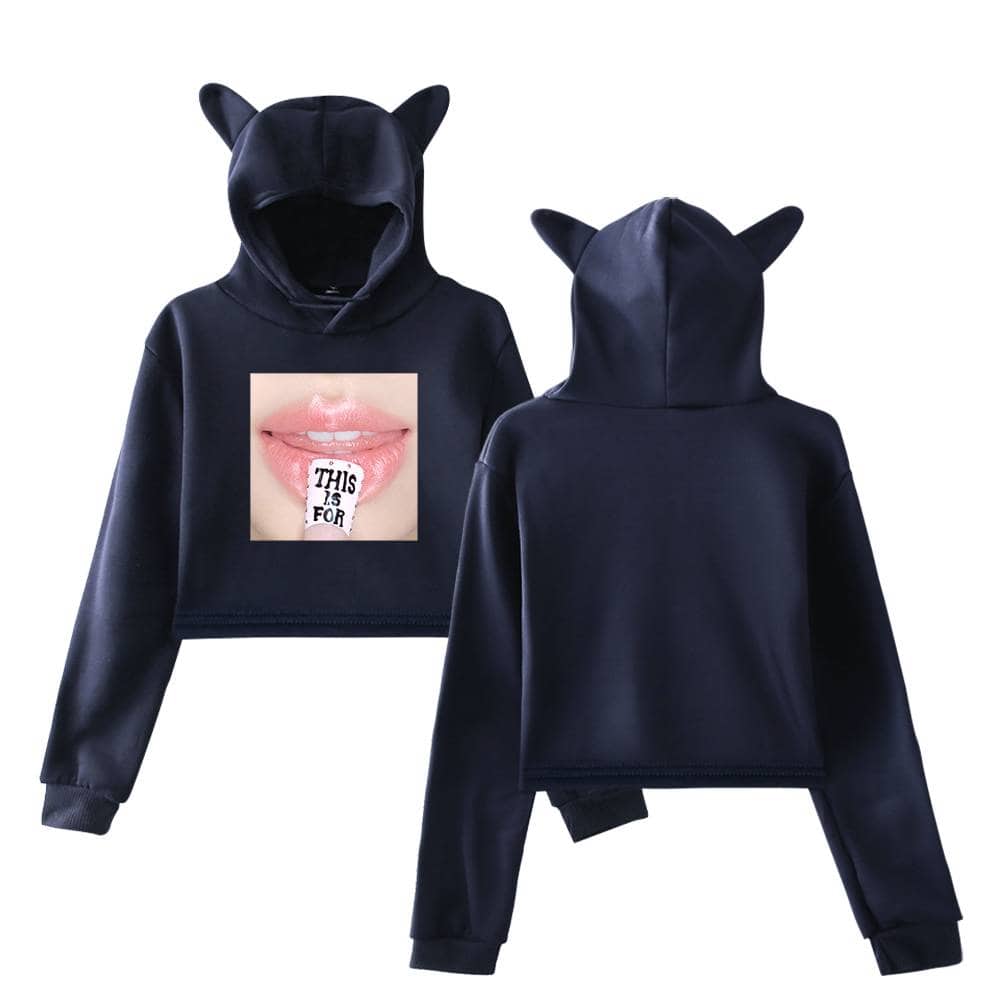 Teen girl hoodie with cat ears and a graphic of lips with a note saying "This is for" on the tongue, black color, trendy K-pop merchandise for fans.
