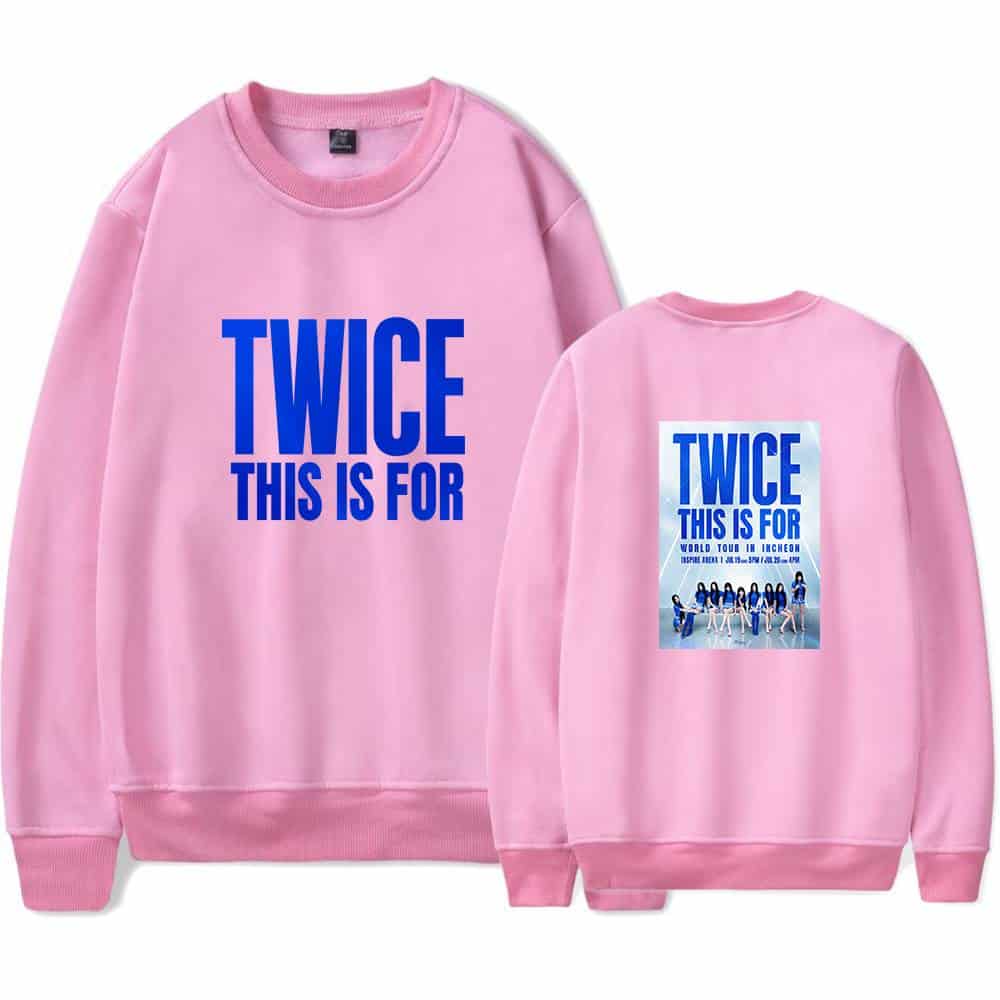 TWICE pink sweatshirt featuring bold text and group photo, perfect for K-pop fans.