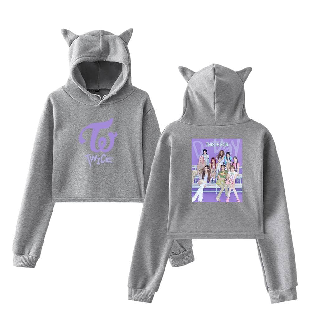 Chromatic grey hoodie with TWICE logo and a colorful girl group print on back, cute and trendy K-pop merchandise.