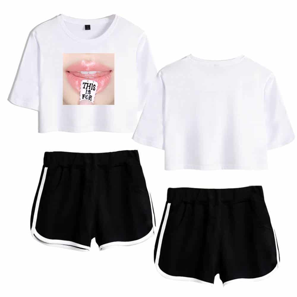 Comfortable K-pop merch set featuring two white crop tops with graphic prints and two pairs of black shorts with white piping, ideal for fans and casual wear.