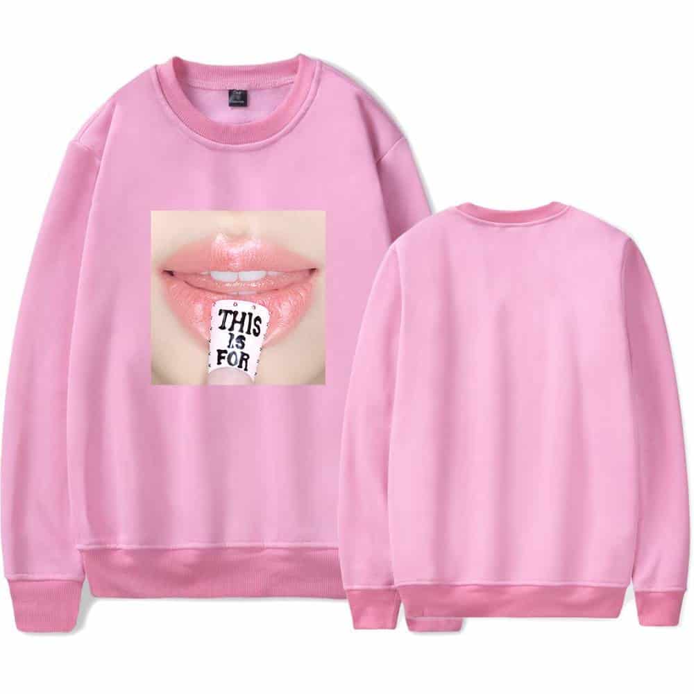 - pink sweatshirt with lips graphic and "This Is For" text on tongue design.