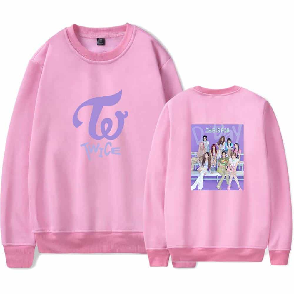 Twice kpop merch sweatshirt with group image and TWICE logo in pink color.
