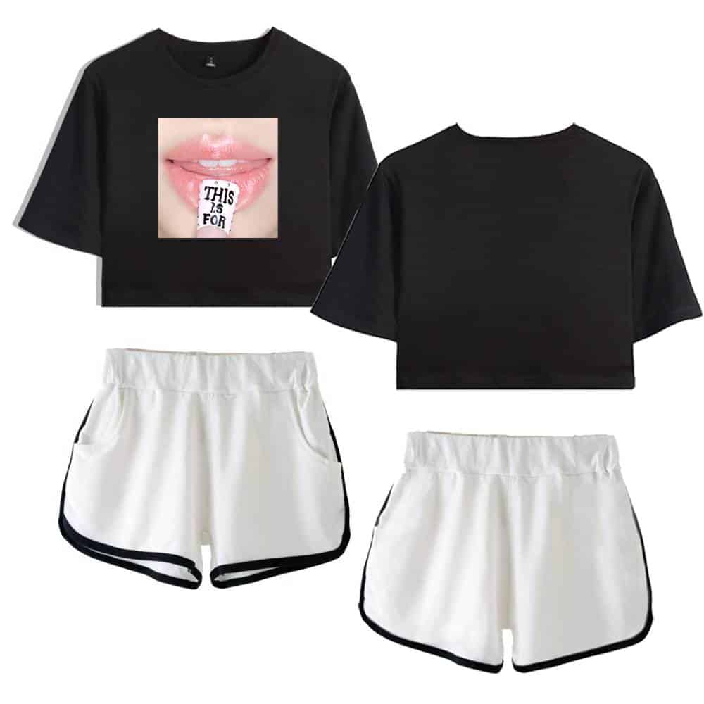 Black cropped t-shirt with a close-up of lips and a sticker reading "This is for" in hand, paired with white athletic shorts with black trim.
