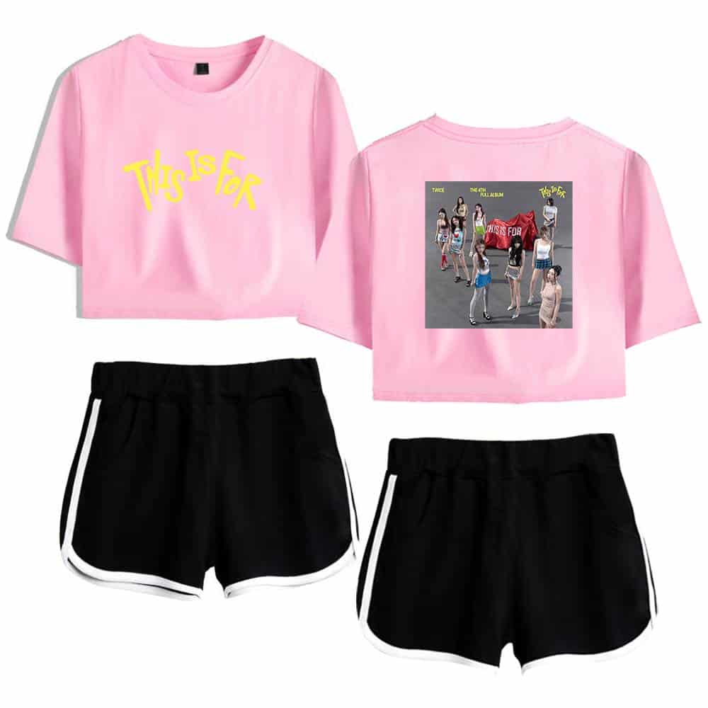 Twin kpop merch pink crop top and graphic tee with black shorts, trendy K-pop fashion accessories for fans.